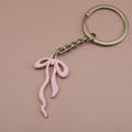 Zinc Alloy Geometric Bow Keychain Bag Charm Gift view 8