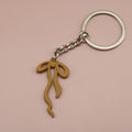 Zinc Alloy Geometric Bow Keychain Bag Charm Gift view 10