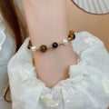 Vintage Gold Plated Faux Pearl Tiger Eye Beaded Bangle With Round Geometric Charm view 1