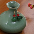 Vintage Chinese Style Green Resin Bead Dangle Hook Earrings With Red Accent Beads Elegant Ethnic Drop Earrings view 4