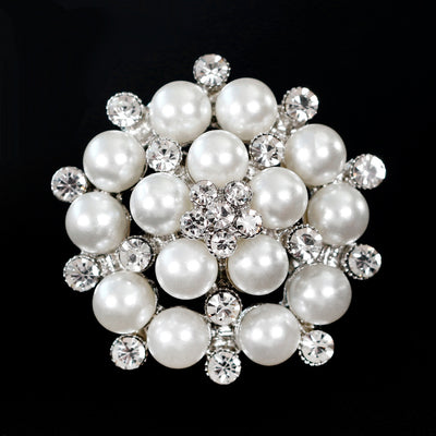 Front product view of the flower brooch pin in black and silver
