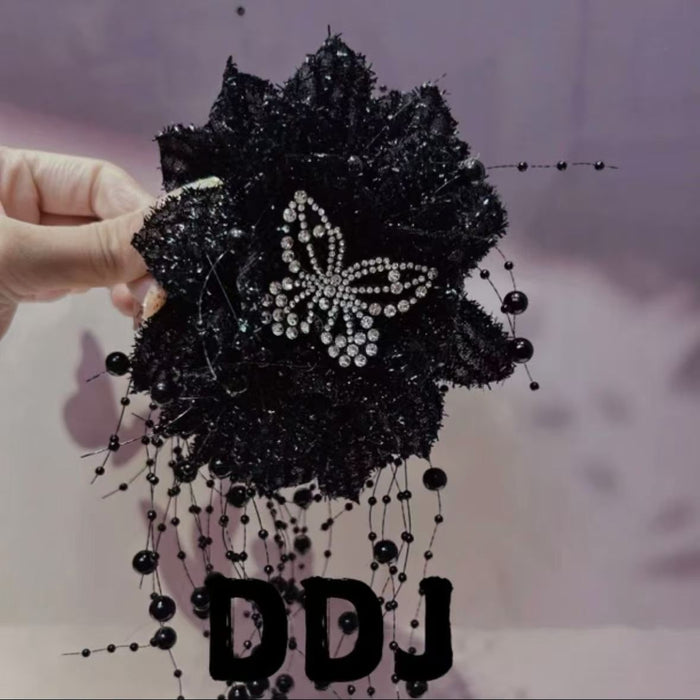 Lurex Flower Butterfly Tassel Claw Clip With Statement Design