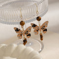 New Chinese Vintage Maillard Brown Butterfly Acrylic Pearl Beaded Tassel Alloy Hook Drop Earrings view 2