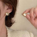 Light Luxury Copper Pearl Bow Tassel Chain Asymmetric Geometric Stud Earrings For Women view 2
