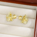 Elegant French Gold Alloy 3D Flower Stud Earrings With Pearl Accent Luxury Metal Floral Earrings view 3