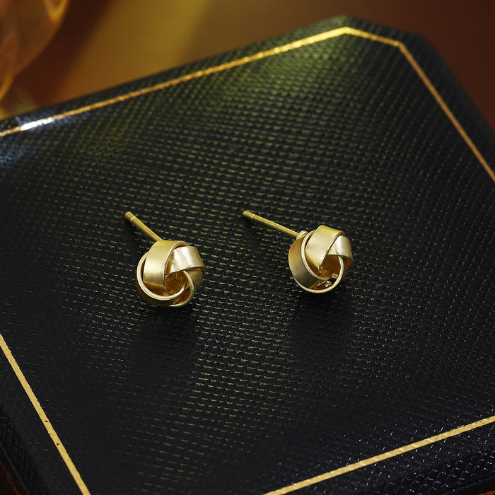 Elegant Matte Gold Alloy Twisted Knot Studs For Women Luxury Minimalist Small Wrap Design Earrings