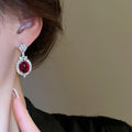 Copper Red Rhinestone Oval Flower Stud Earrings With Silver Pins Light Luxury European Style view 3