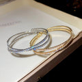 French Minimalist Pave Zircon Cross Open Copper Bangle With Circle Detail view 2