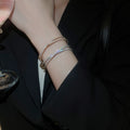 French Minimalist Pave Zircon Cross Open Copper Bangle With Circle Detail view 3