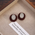 Vintage Matte Round Disc Alloy Stud Earrings With Hammered Oval Metal Accent Elegant French Luxury Earrings view 4