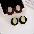 Vintage Matte Round Disc Alloy Stud Earrings With Hammered Oval Metal Accent Elegant French Luxury Earrings view 1