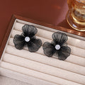 Elegant Hollow Black Flower Alloy Earrings With Rhinestone Center, Luxury Two-Way Floral Stud Earrings view 4