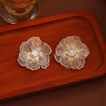 Elegant Multilayer Hollow Flower Petal Alloy Studs With Sparkling Zircon Center Luxury Two Tone Earrings view 4