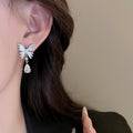 Light Luxury Butterfly Zircon Faux Pearl Asymmetric Stud Earrings With Mother Of Pearl Accents view 4