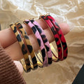 Light Luxury Leopard Print Leather Hoop Earrings With Silver Needle Posts For Women view 1