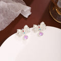 Elegant Korean Silver Alloy Liquid Bow Studs With Purple Crystal Drops And Rhinestone Accents Earrings view 3