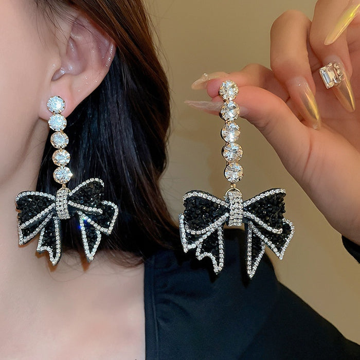 Chic Alloy Bow Drop Earrings With Zirconia Accents And Silver Needle Posts