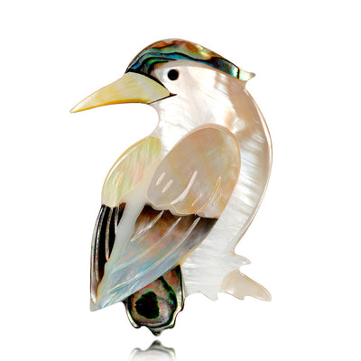 Front product view of the shell brooch pin in gold and silver