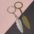Zinc Alloy Minimalist Feather Keychain Bag Charm Gift (6215) view 1