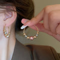 Light Luxury Faux Pearl Ball Twist Texture Geometric Hoop Earrings For Women view 1
