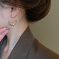 Light Luxury Faux Pearl Ball Twist Texture Geometric Hoop Earrings For Women view 3