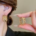 Real Gold Plated Zircon Interlocking Hoop Earrings For Women Light Luxury Geometric Metal Ear Cuffs view 4