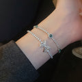 French Light Luxury Copper Zircon Bow Bangle Sparkling Minimalist Fashion Bracelet view 2