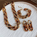 Maillard Leopard Print Acrylic Oval Interlocking Earrings Necklace Bracelet Jewelry Set view 1