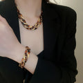Maillard Leopard Print Acrylic Oval Interlocking Earrings Necklace Bracelet Jewelry Set view 2