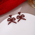 Light Luxury Red Enamel Bow Pendant Heart Stud Drop Earrings For Women New Year Elegant Earrings view 2