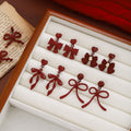 Light Luxury Red Enamel Bow Pendant Heart Stud Drop Earrings For Women New Year Elegant Earrings view 1