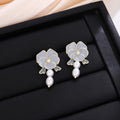 Elegant French Vintage Enamel Camellia Flower Pearl Drop Alloy Silver Needle Women's Fashion Earrings view 3