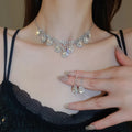 Light Luxury Copper Rhinestone Waterdrop Tassel Necklace And Earrings Jewelry Set view 3