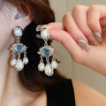 Vintage Eye Faux Pearl Tassel Stud Earrings For Women, Alloy Geometric Statement Light Luxury Jewelry view 4