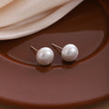 Elegant French Minimalist Small Round Pearl Studs With Silver Needle For Women Light Luxury Earrings view 2