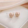 Elegant French Minimalist Small Round Pearl Studs With Silver Needle For Women Light Luxury Earrings view 4