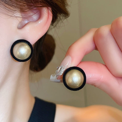 Light Luxury Round Faux Pearl Stud Earrings With Flocked Finish And Silver Posts
