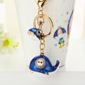 Blue and White Whale Keychain with Enamel Body and Gold Tone Ring view 1