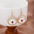 Elegant Gold Alloy Round Hollow Nurse Hat Enamel Drop Hook Dangle Jewelry Women's Earrings view 1
