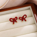 Elegant Red Enamel Bow Stud Earrings For Women, Irregular Alloy Ribbon Knot Winter Fashion Earrings view 4