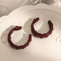 Vintage C Shape Leather Wrapped Alloy Hoop Earrings For Women Elegant Maillard Leopard Texture Earrings view 3