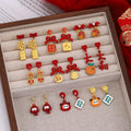 Elegant Chinese New Year Red Enamel Bow Fu Character Lucky Orange Alloy Pearl Stud Dangle Earrings view 1