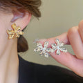 Light Luxury Metal 3D Flower Stud Earrings With Silver Posts, Minimalist Elegant Floral Jewelry view 1