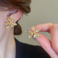 Light Luxury Metal 3D Flower Stud Earrings With Silver Posts, Minimalist Elegant Floral Jewelry view 3