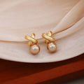 French Vintage Cross Champagne Pearl Alloy Studs Elegant Light Luxury Women's Fashion Earrings view 3