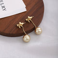 Elegant Two Way Gold Alloy Bowknot Studs With Champagne Pearl Drop For Women Luxury Fashion Earrings view 2