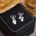 Elegant Alloy Bow Knot Studs With Shiny Sequin Disc Tassel Pendant For Women Fashion Earrings view 3