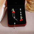 Light Luxury Asymmetric Cherry Enamel Rhinestone Pearl Tassel Alloy Long Drop Stud Earrings view 1