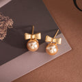 Elegant Korean Gold Bowknot Faux Pearl Studs Sweet Light Luxury Fashion Alloy Silver Needle Earrings view 2