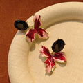 Luxury Contrast Red Enamel Flower Petal Dangle With Black Crystal Studs And Gold Alloy Trim Earrings view 4